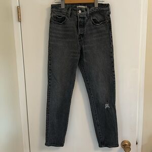 Levi’s wedgie VGUC high rise, button fly grey jeans, distressing on one leg.
